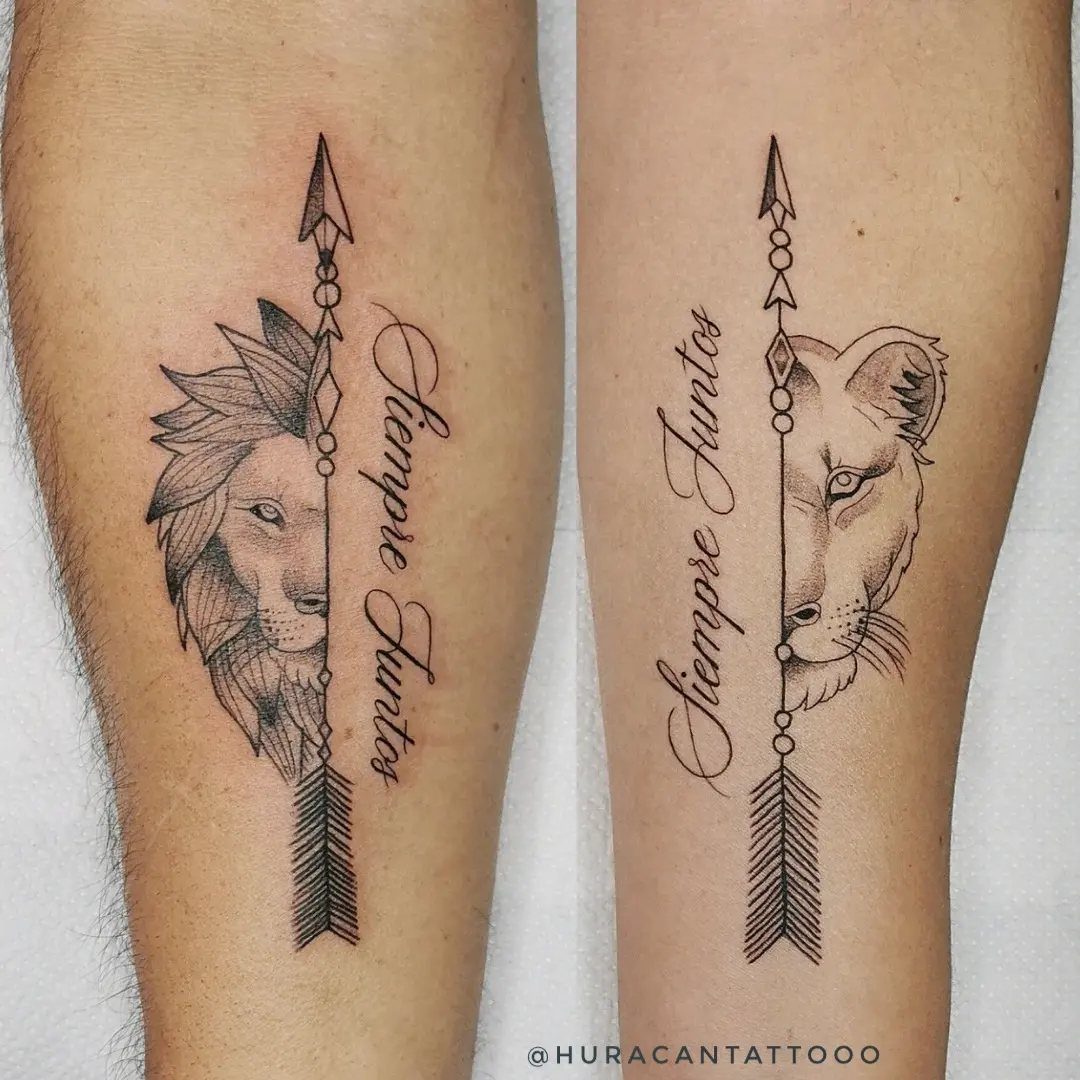 Matching lion and lioness tattoos on two forearms with arrows and Spanish text.