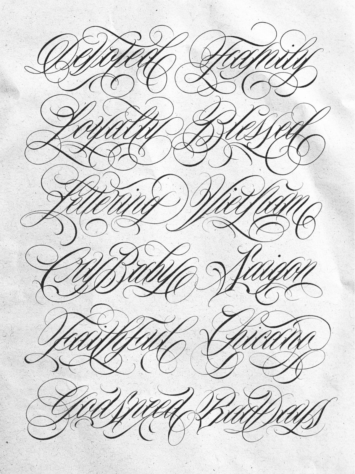 Ornate cursive lettering sketches with flourishes drawn in black ink on white paper.