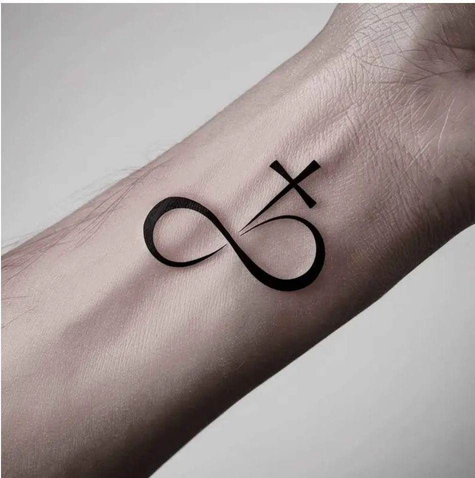Black ink tattoo of a cross intersecting an infinity symbol on a wrist.