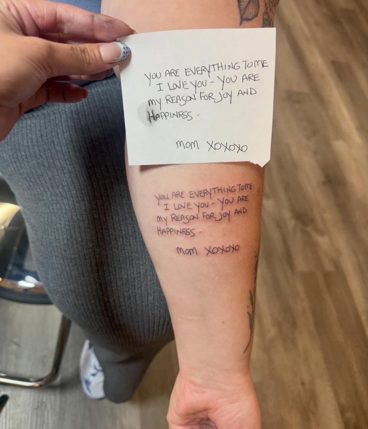 Forearm tattoo of a handwritten note compared to the original paper note.
