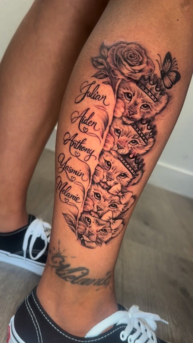 Tattoo on a leg showing five lion cubs with cursive names beside them.
