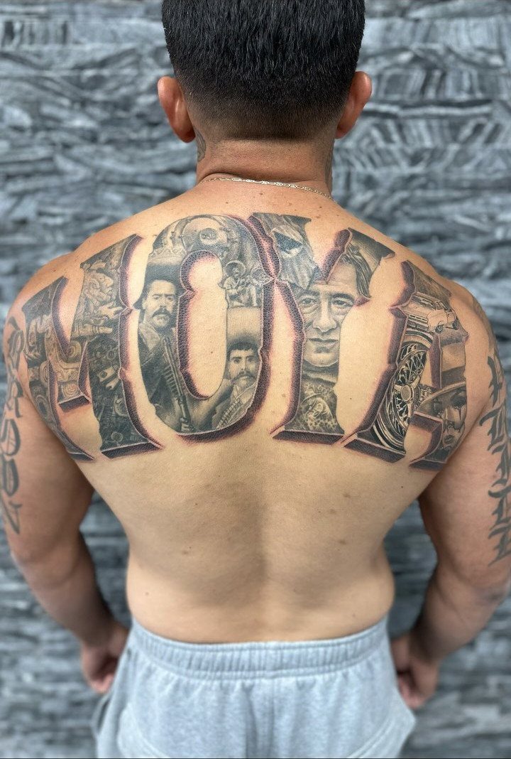 Custom hand-lettering tattoo on a man's back spelling MOYA with portraits inside letters.