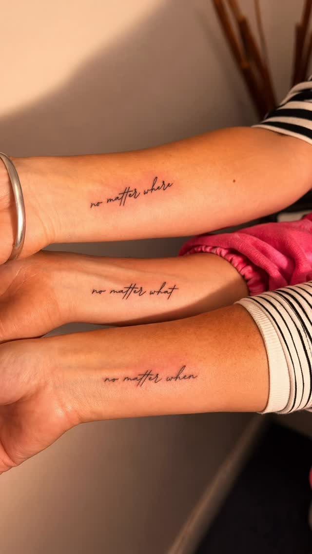 Three forearms with matching script tattoos reading no matter where, what, and when.