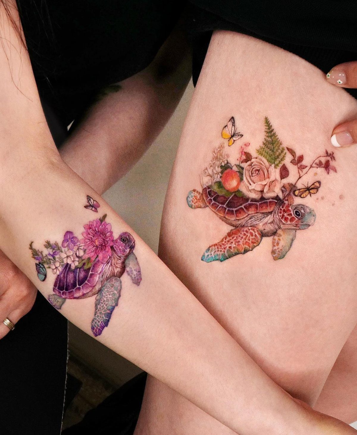 Matching sea turtle tattoos with colorful flowers on a forearm and a thigh.