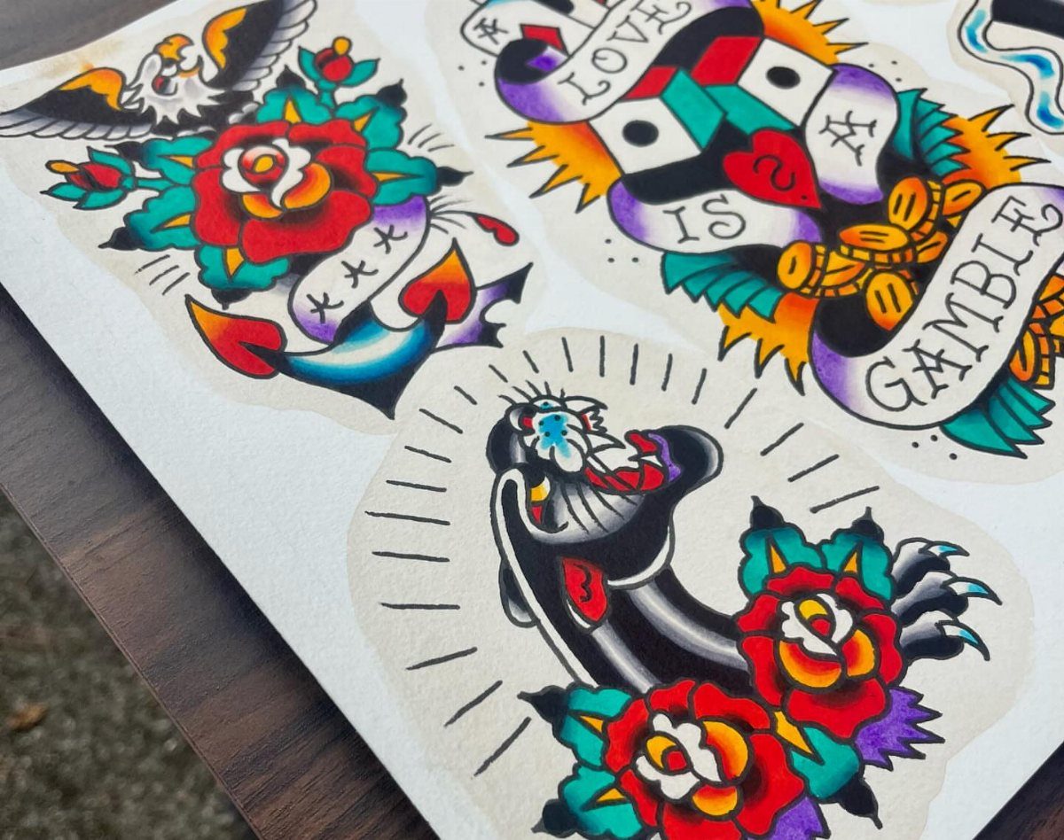Traditional tattoo flash sheet featuring an eagle, black panther, and heart with roses.