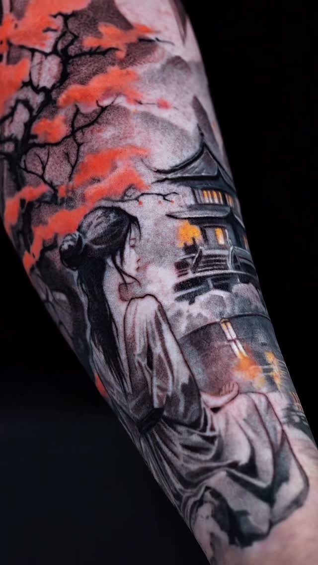 Tattoo on an arm depicting a woman in kimono with a pagoda and orange tree.
